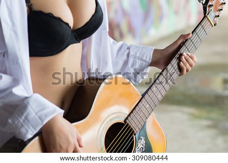 Sexy woman Playing the Guitar,Music Team