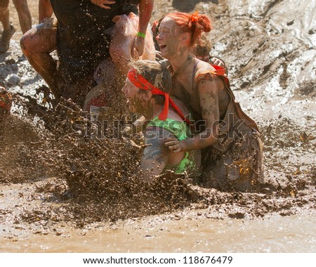 BOISE, IDAHO - AUGUST 25: People splash and make a mess at the Dirty Dash August 25 2012 in Boise, Idaho