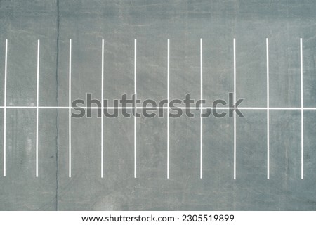 Similar – Image, Stock Photo Empty parking space in the backyard of a commercial / residential area