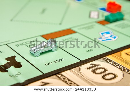 BOISE, IDAHO - NOVEMBER 18, 2012: The game Monopoly has been published by Parker Brothers since 1935