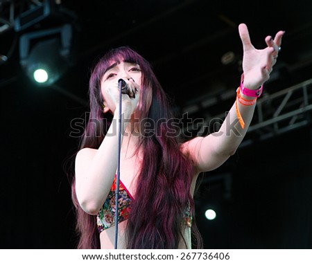 BOISE, IDAHO/USA - MARCH 29, 2015:Ciscandra Nostalghia from the band Nostalghia sings to the crowd at the Tree Fort Music Festival