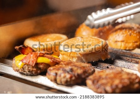 Similar – Image, Stock Photo Anonymous person eating toast with eggs and cheese