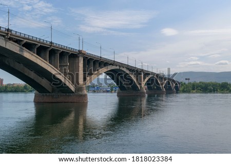 Similar – Image, Stock Photo Large bridge over river with cars traffic