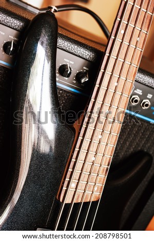 Bass guitar and amp . Selective focus