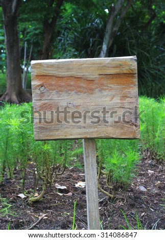 wood sign in a garden