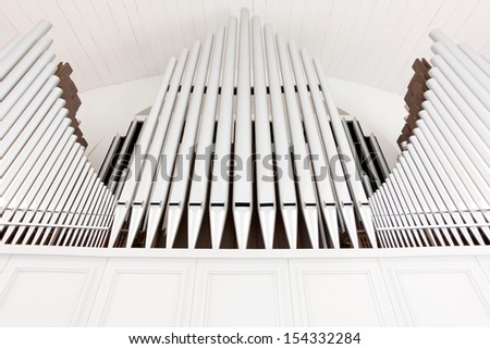white church organ pipes