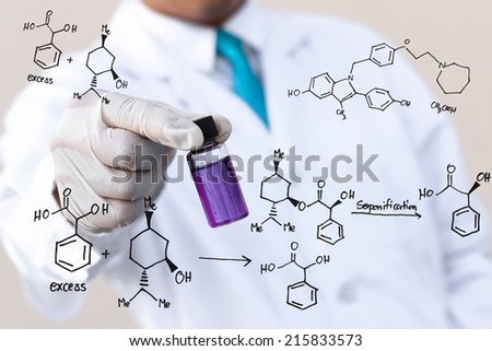 Male scientist holding a vial with chemical reaction.