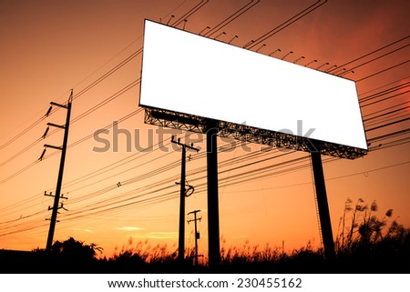 Blank billboard silhouette at sunset for advertisement