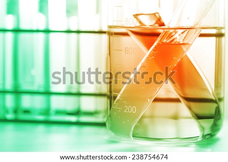 the glassware, beaker and test tubes in laboratory room.