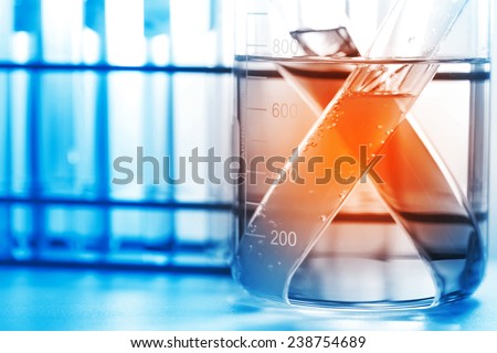 the glassware, beaker and test tubes in laboratory room.