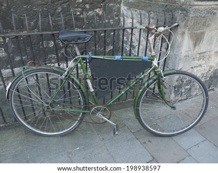 Vintage bicycle.  It is an image of vintage bicycle in front of a building.