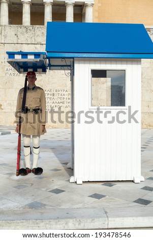 ATHENS, GREECE - MAY 15: Evzones changing the guard at the Tomb of the Unknown Soldier in front of the Greek Parliament Building at Syntagma Square on May 15, 2014 in Athens,Greece.