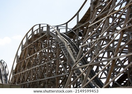 Similar – Image, Stock Photo Wooden roller coaster