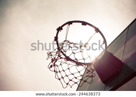 Vintage  Old Wooden basketball hoop under the sunset that mean hit the target