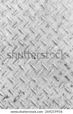 White Background of old metal diamond plate in silver color background