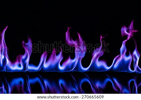 Blue color fire flames on black background