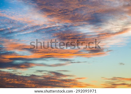Bright orange and yellow colors sunset sky / Yellow blue sunrise sky with sunlight background