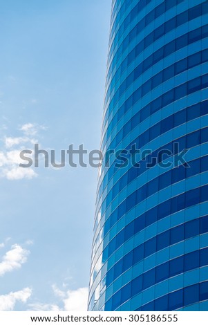 Modern office building with glass reflection background