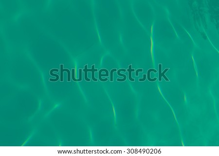 light green water ripple in the pool background