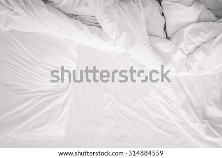 Top view of f bedding sheets and pillow after sleep