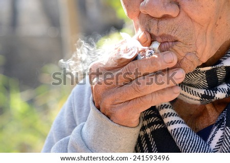 Old man smoking