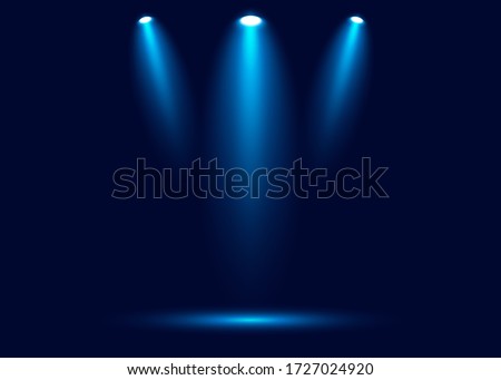 spotlight shines on the stage, scene, podium. Bright lighting with spotlights. Spot lighting of the stage. Lens flash light effect from a lamp or spot