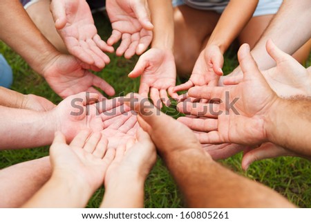 Stack of hands - real people agreement