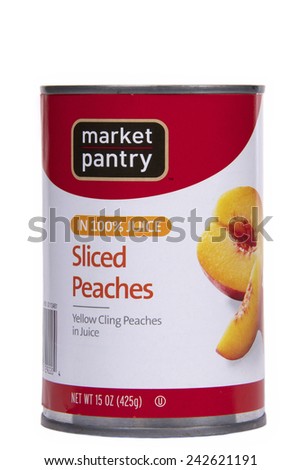 ALAMEDA, CA - JANUARY 07, 2015: 15 ounce can of Market Pantry brand Sliced Peaches. Yellow Cling Peaches in Juice. Market Pantry is produced by Target Corporation.