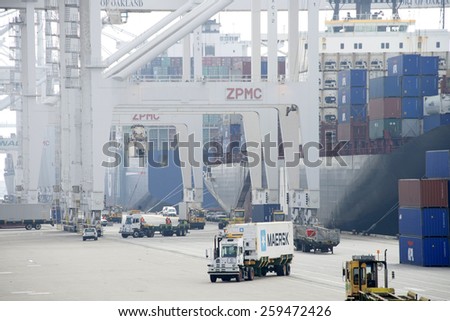 OAKLAND, CA - MARCH 09, 2015:. Efforts to eliminate a cargo backlog at the Port of Oakland. The Port says gains in container movement are visible from ship to shore.
