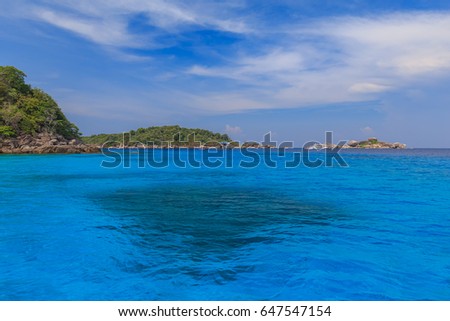 Tropical Island Beach And Fishing Boat With Clear Blue Lagoon Water At Lipe Island Satun Tropical Island Beach And Fishing Boat With Clear Blue Lagoon Water At Lipe Island Satun