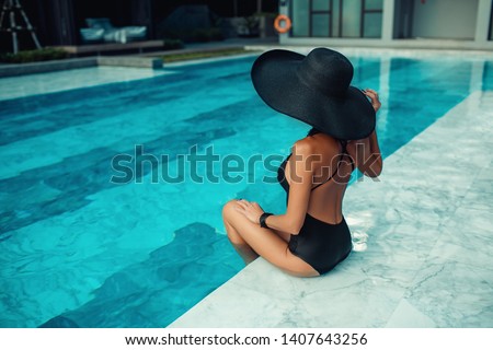 Similar – Image, Stock Photo Unrecognizable woman resting near sea and cliffs