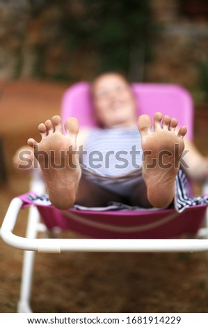 girl is resting on a chaiselongue Stock foto © 