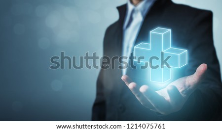 Businessman hand holding plus sign virtual means to offer positive thing (like benefits, personal development, social network) Foto stock © 