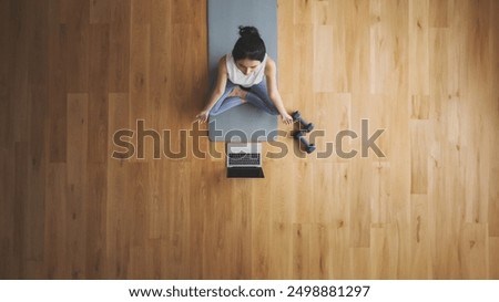 Similar – Image, Stock Photo Calm woman practicing yoga in Warrior position