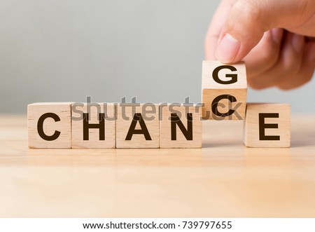 Hand flip wooden cube with word change to chance, Personal development and career growth or change yourself concept Foto stock © 