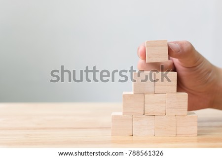 Hand arranging wood block stacking as step stair. Business concept for growth success process Stock foto © 