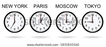 Clocks at different times on white background 