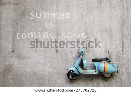 Text summer is coming soon woodern blue old scooter