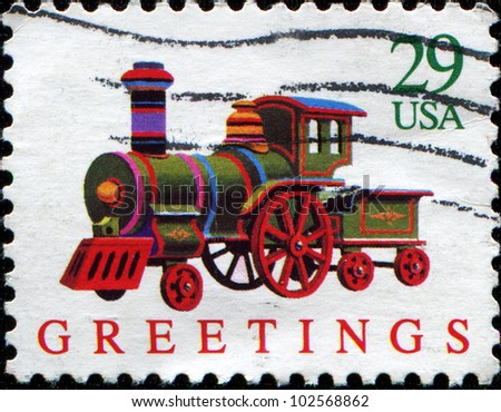 USA - CIRCA 1975: A stamp printed in USA  dedicated to the Christmas, shows toy engine, circa 1975