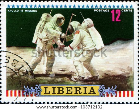 LIBERIA - CIRCA 1972: A post stamp printed Liberia shows Moon Mission of Apollo 16 Setting up equipment, circa 1972