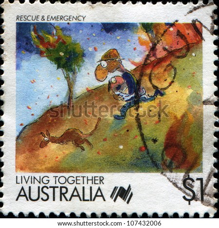 AUSTRALIA - CIRCA 1988: A stamp printed in Australia shows Living Together cartoons Rescue and Emergency, circa 1988