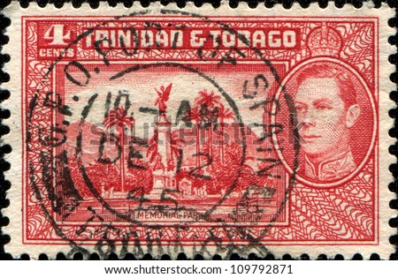 TRINIDAD AND TOBAGO - CIRCA 1938: A stamp printed in Trinidad and Tobago shows Memorial Park, Port of Spain with portrait of King George VI, circa 1938
