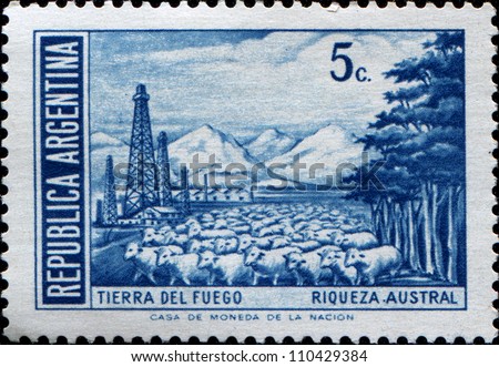 ARGENTINA - CIRCA 1959: A stamp printed in the Argentina, shows the Tierra del Fuego Province and flock of sheep, circa 1959