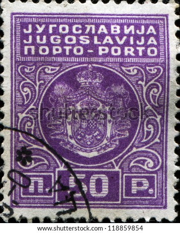 YUGOSLAVIA - CIRCA 1931: A stamp printed in Yugoslavia shows  coat of arms of Yugoslavia, circa 1931