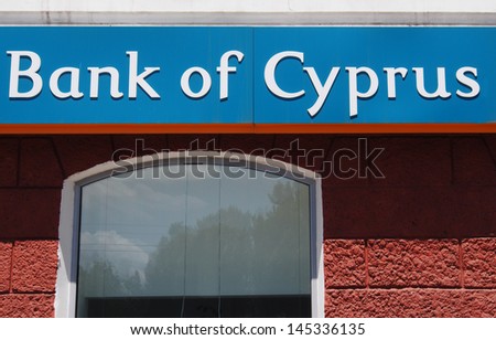 LUGANSK, UKRAINE - JULY 9: The emblem Bank of Cyprus, July 9, 2013 in Lugansk, Ukraine. Bank of Cyprus  is a major Cypriot financial institution