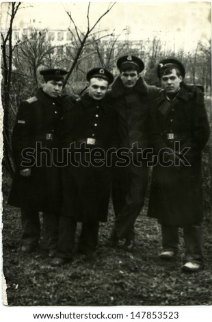 USSR - CIRCA 1970s: Vintage photo shows four sailors, 1970s