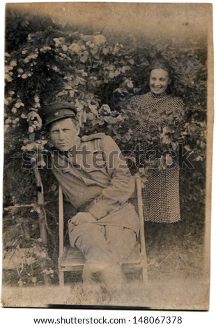 DERMANY - CIRCA MAY 1945: Vintage photo shows man and woman - Soviet Army soldiers, Germany, May, 1945