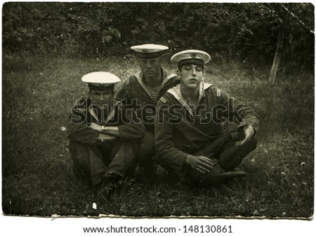 USSR - CIRCA 1970s: Vintage photo shows three sailors, 1970s