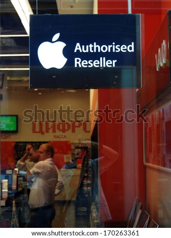 RUSSIA, ROSTOV REGION, AKSAY - AUGUST 17, 2013: Aple logotype in electronic store. Apple Inc. is American multinational corporation headquartered in Cupertino, California