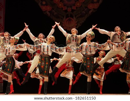 UKRAINE, LUGANSK - MARCH 18, 2014: Ukrainian National Folk Dance Ensemble named After P. Virsky, who is considered the best folkloric ballet dancer in country, performed live show on stage in Lugansk